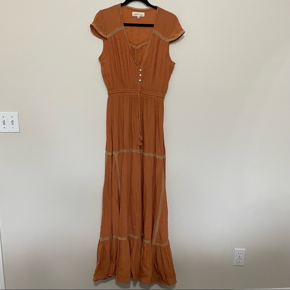 Lost in lunar terracotta cap sleeve crochet detail fit &flare tiered maxi dress
